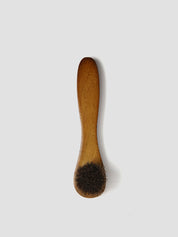 Rounded shoe brush